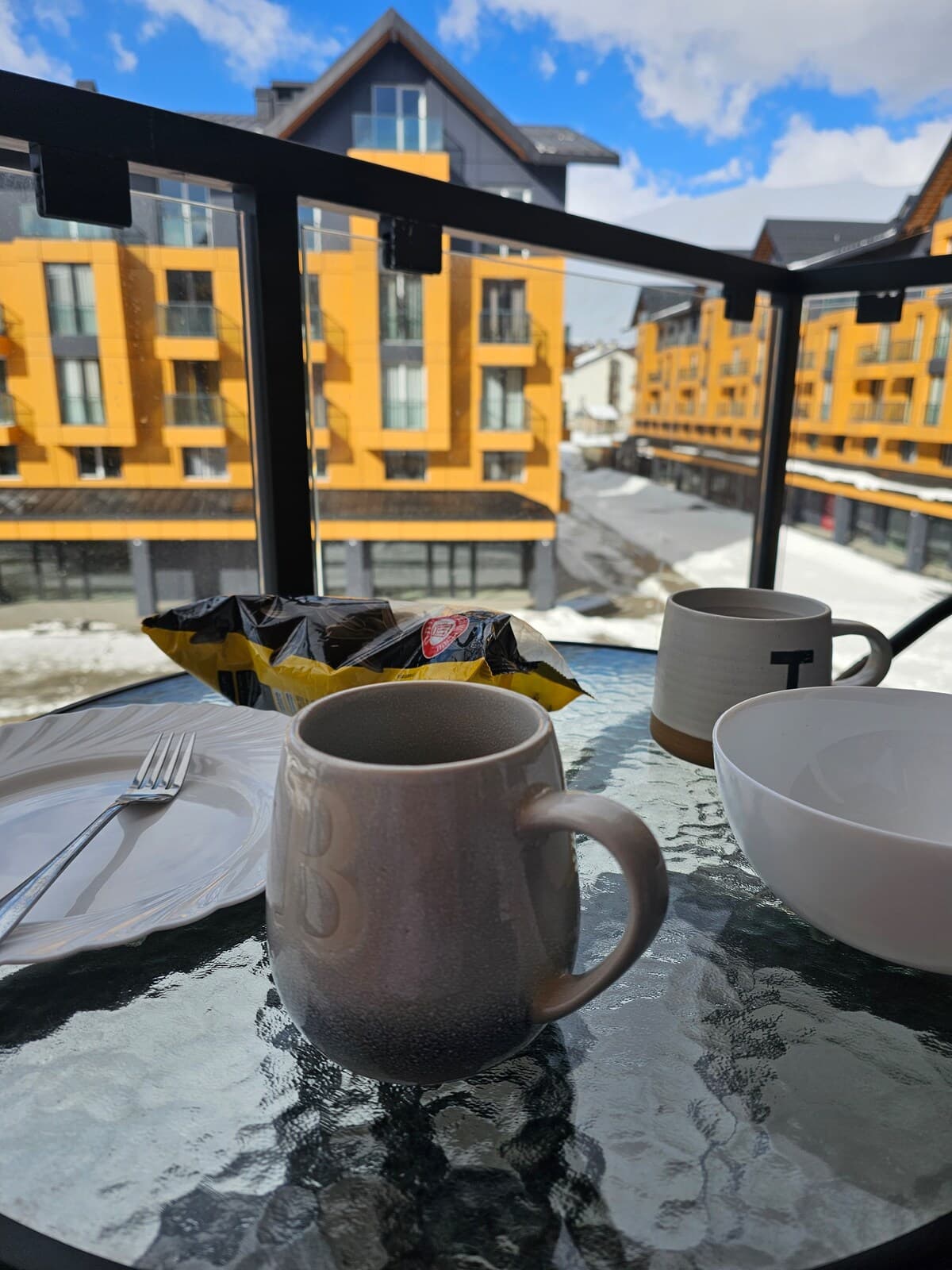 Breakfast on the balcony with village view